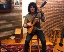 Tommy Thayer, “Here I am with Joan Baez’ 1880 Martin D-40”