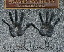 Eddie Van Halen Places Hands in Cement on This Day In Cool As CHITZ History – Hollywood, CA Rock Walk – Guitar Center